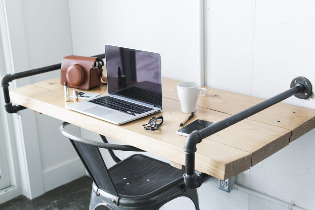 stylish workspace with female things